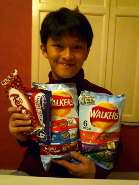 p1000473 Bought a whole bunch of snacks ... notice the exotic flavours of the 'Walkers' potato chips: hoi sin duck, cajun squirrel, chocolate chilli, builder's breakfast, and my favourite fish and chips flavour.